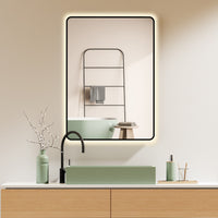 LED wall mirror with black metal frame, light changing