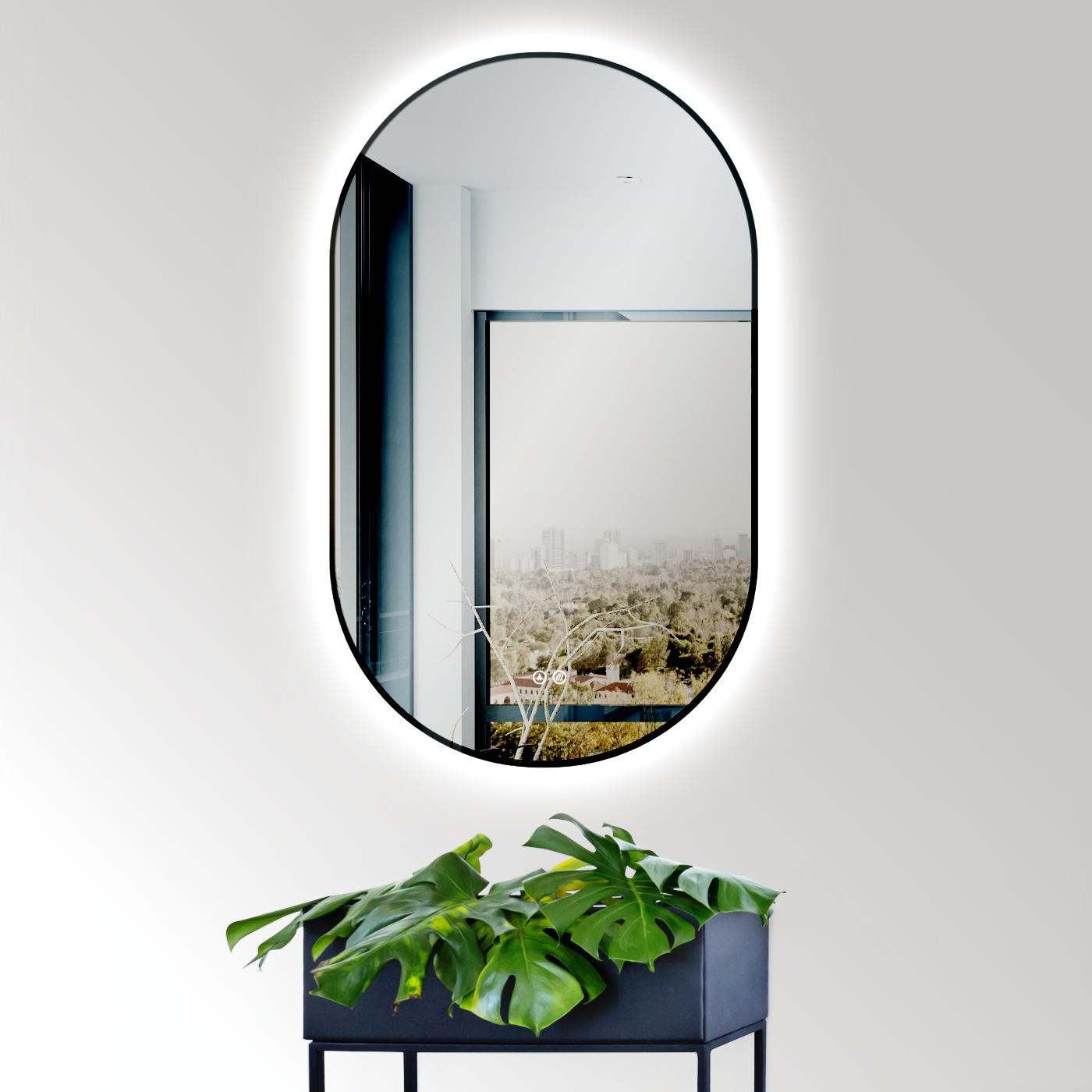 LED Badspiegel mit Lichtwechsel, ovaler Design-Spiegel mit Antibeschlag-Funktion und Schwarz Metall Rahmen